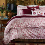 A Taani Berry Organic Duvet from John Robshaw with a red and white comforter. - 30395658502190