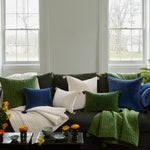 A living room with the John Robshaw Velvet Moss Decorative Pillow. - 30484739620910