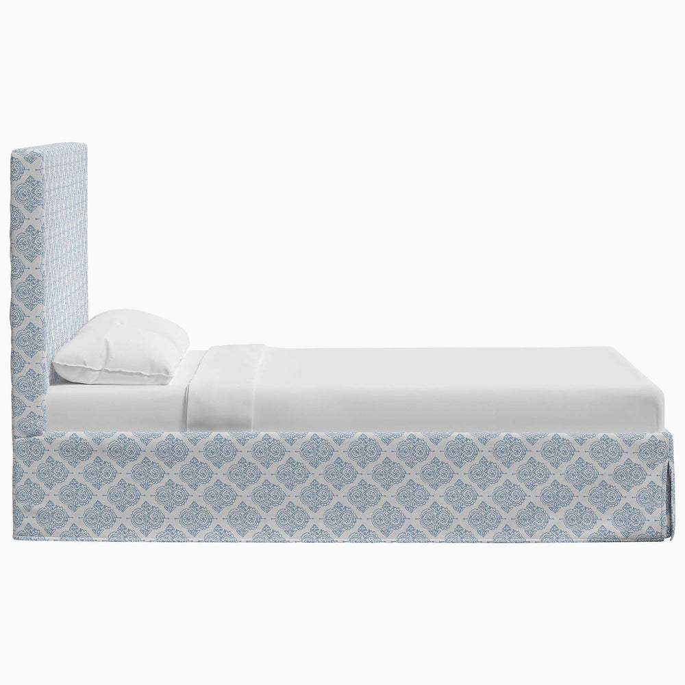 A Shona bed from John Robshaw with a blue and white pattern on its prints and fabrics.