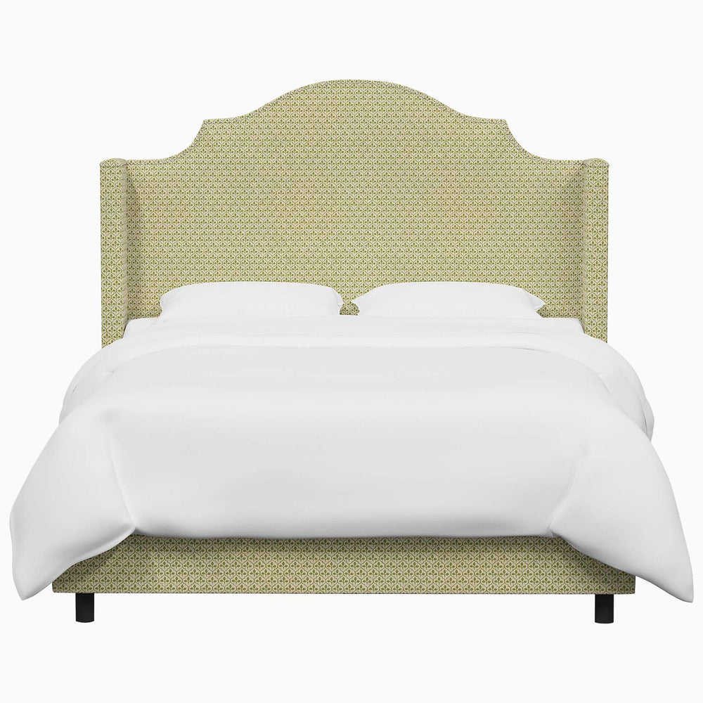 The John Robshaw Samrina bed features a green upholstered headboard, inspired by John Robshaw's Mughal arches designs.