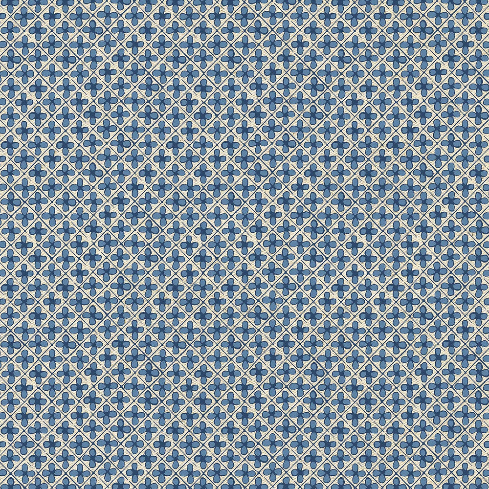 A John Robshaw swatch of blue and white fabric with small squares, perfect for adventurous prints.