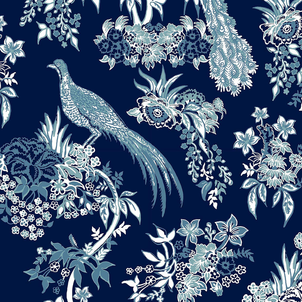 A swatch of the John Robshaw Preeti Accent Chair, a blue and white floral pattern with adventurous prints featuring peacocks.
