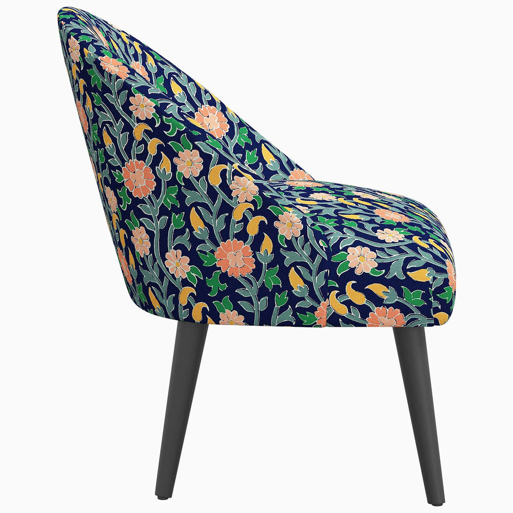 Description updated: A Southeast Asian Chetna Accent Chair with a mid-century silhouette and prints inspired by John Robshaw.