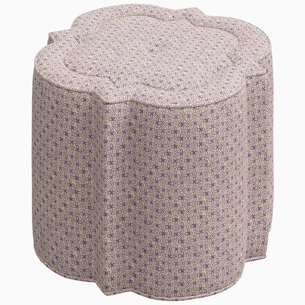 A petite Shiza Ottoman by John Robshaw, with a charming flower pattern, perfect for adding a touch of charm to any interior space.