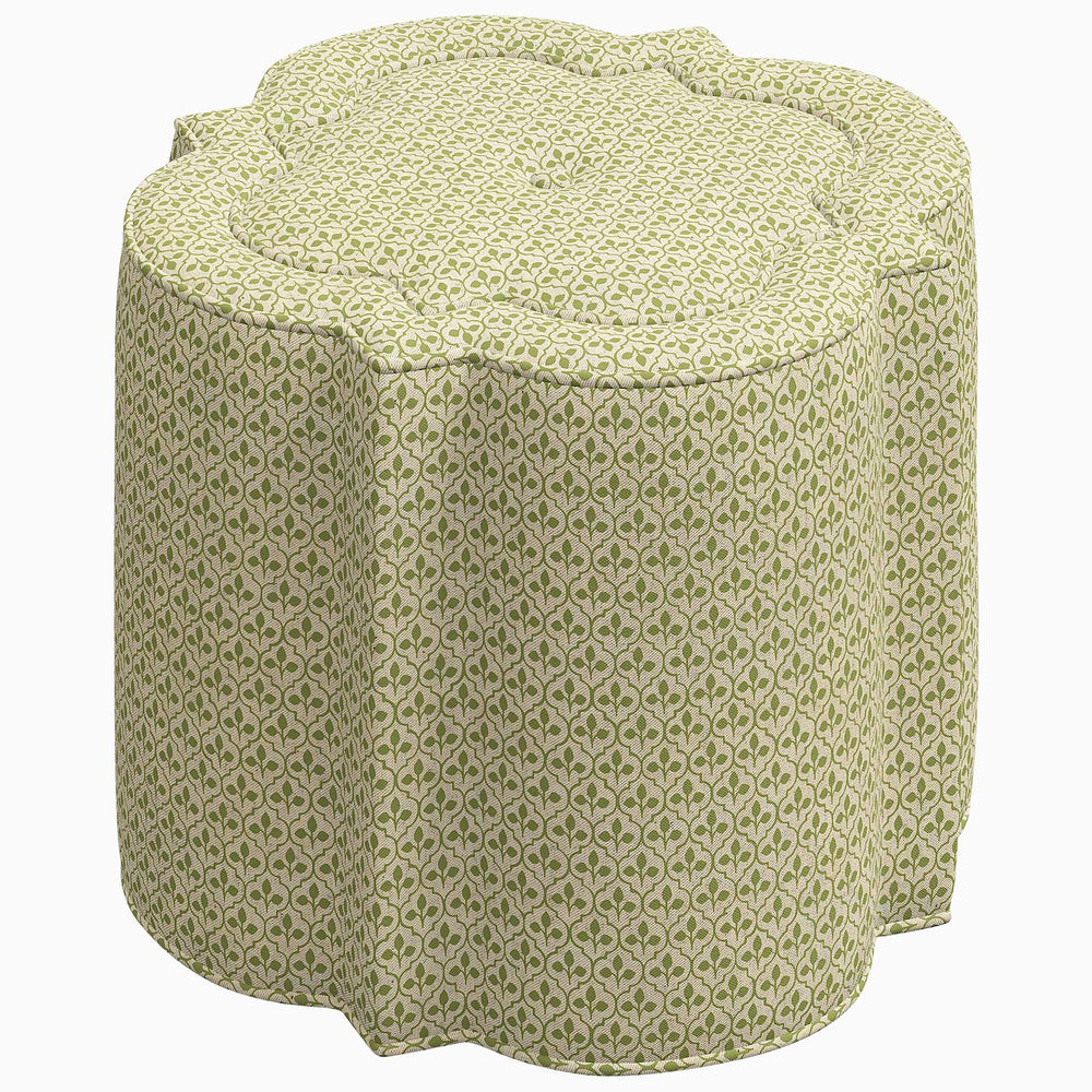 A Shiza Ottoman by John Robshaw with a floral swatch pattern.