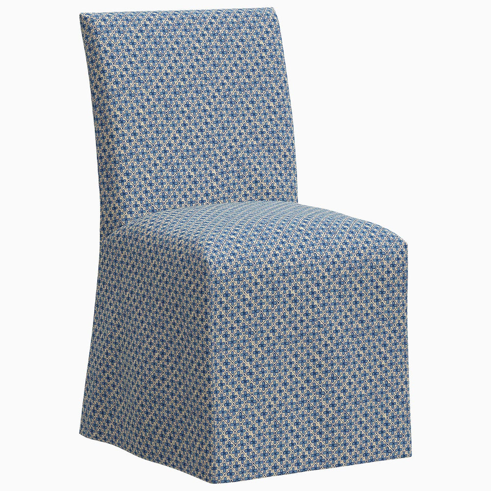 The John Robshaw Sadia Slipcover Chair features a blue patterned slipcover on a white background.