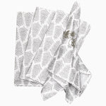 A John Robshaw Lia Silver Napkins (Set of 4) with a hand printed leaf pattern on it. - 30405249073198