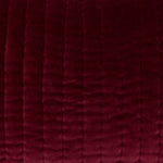 A close up image of a John Robshaw Velvet Berry Kidney Pillow. - 30404892196910