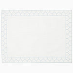A white cotton slub Stitched Light Indigo Placemat with blue hand stitching on it by John Robshaw. - 29333345304622