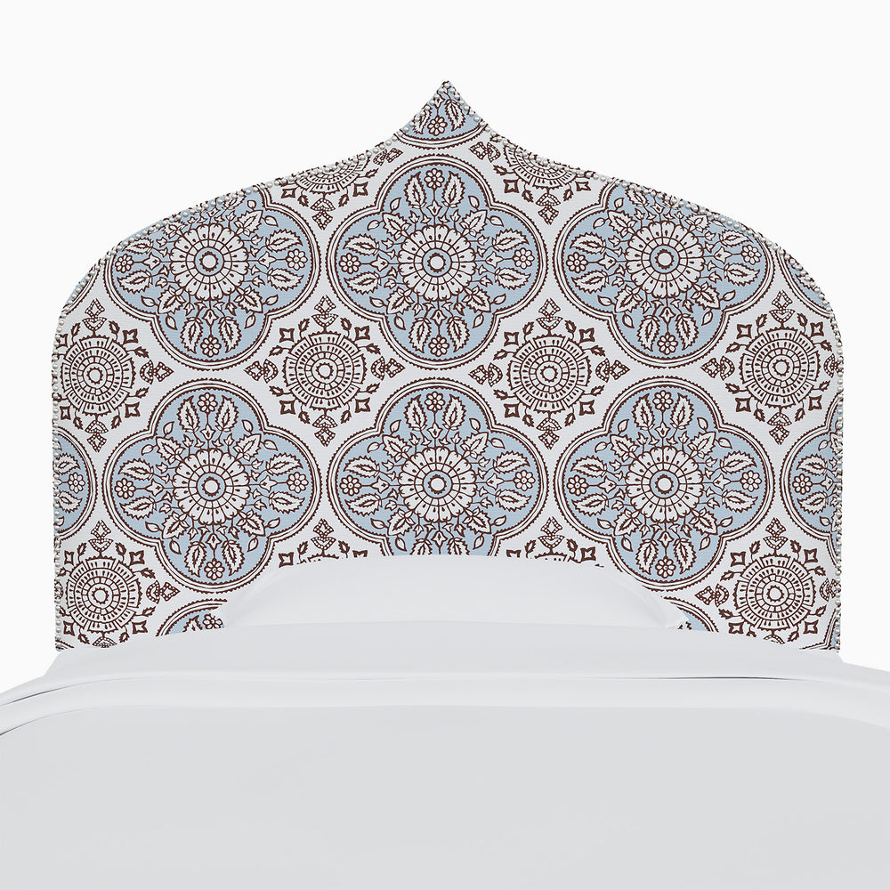 The John Robshaw Alina headboard features exquisite Mughal arches in a stunning blue and brown pattern.