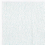 A white towel with turquoise dots on it, made from organic cotton, called the Organic Hand Stitched Seaglass Quilt by John Robshaw. - 28007260815406