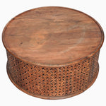 A Round Wooden Jali Table with intricately carved sides by John Robshaw. - 30280699281454