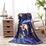 A 100% cotton Dhule Indigo Beach Towel with a camel on it by John Robshaw. - 29274375061550
