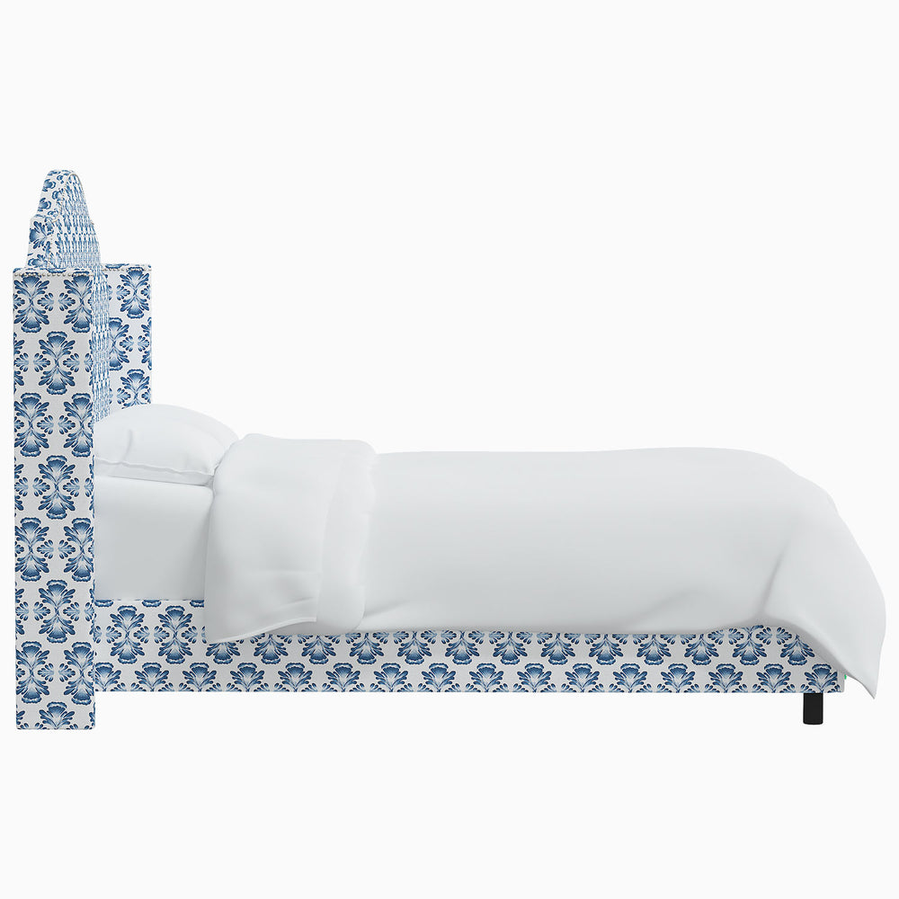 The John Robshaw Samrina Bed features a beautiful blue and white pattern inspired by Mughal arches. John Robshaw's exquisite design brings an elegant touch to any bedroom.