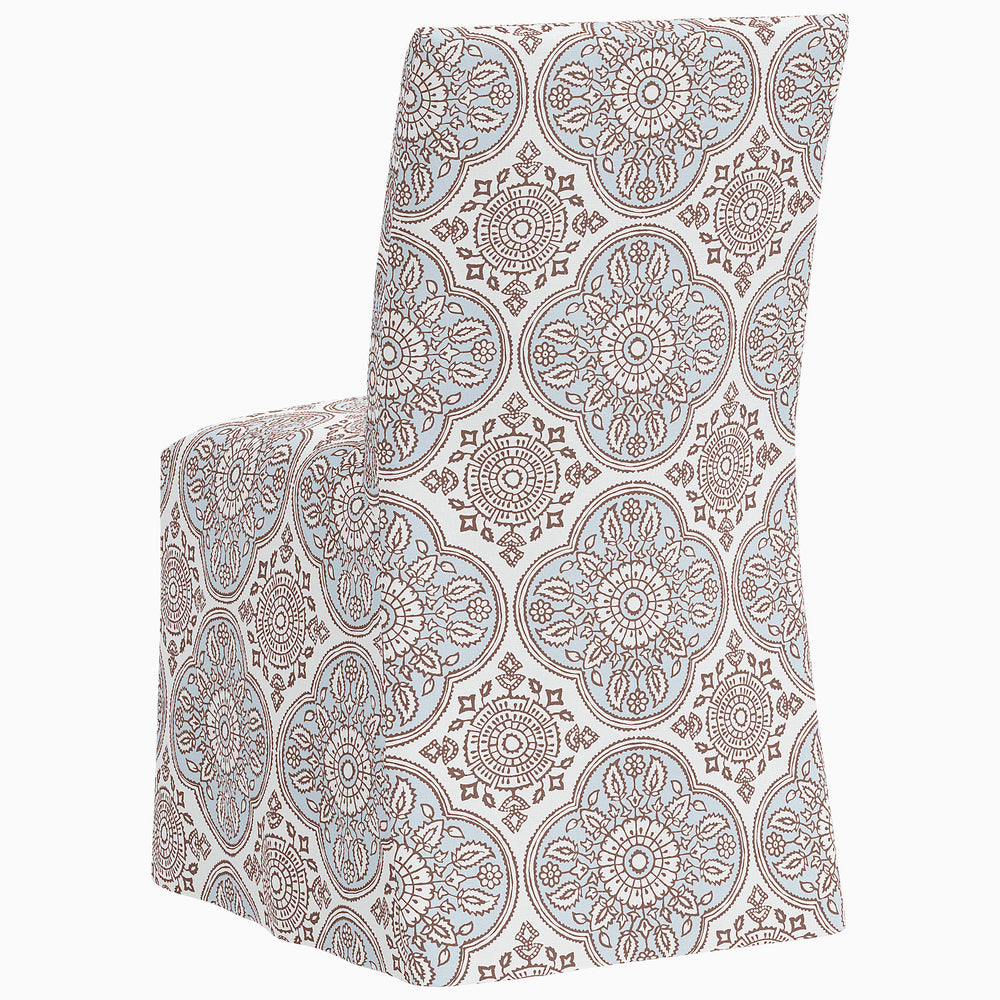 John Robshaw Sadia Slipcover Chair with a blue and white paisley pattern.