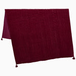 A hand quilted Velvet Berry Throw created by Indian artisans on a white background. - 30395669479470