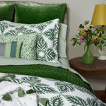 A bed with Dasati Dark Sage Organic Duvet and John Robshaw pillows made of organic cotton. - 30491131183150
