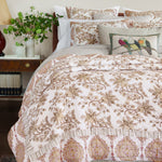 A John Robshaw Avni Natural Bolster, hand-stitched and printed by hand, with a floral pattern. - 30400039190574
