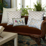 A brown Advika Kidney Pillow by John Robshaw in a living room with a hidden zipper closure. - 30399875842094