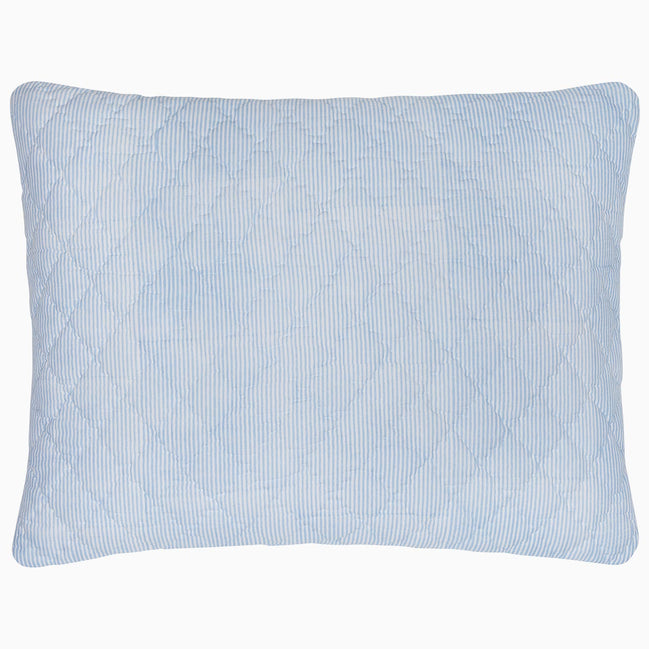 A Nandi Light Indigo Quilted Pillow on a white background, made with cotton voile, by John Robshaw.