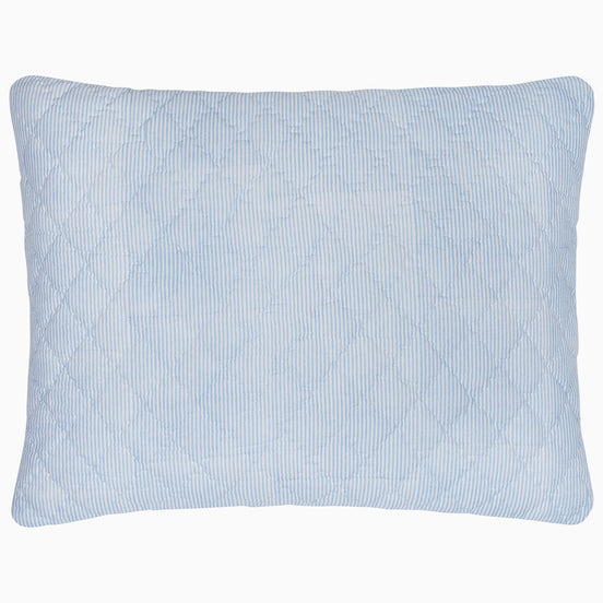 A Nandi Light Indigo Quilted Pillow on a white background, made with cotton voile, by John Robshaw.