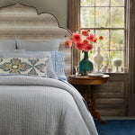 A reversible bed with a Vivada Light Gray Woven Quilt by John Robshaw in a room with a window. - 30783864995886