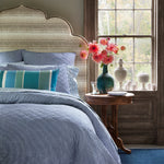 A blue and white bedroom with Nandi Indigo Quilt pillows by John Robshaw. - 30783827607598