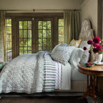 A bedroom with a Dani Euro bed, a Dani Euro pillow, and a window. (John Robshaw) - 30801456660526