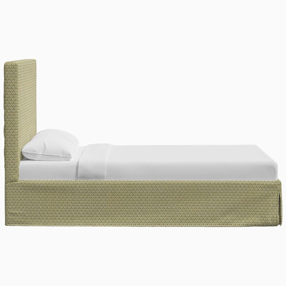 A Shona Bed by John Robshaw with an upholstered headboard and footboard featuring Shona fabrics.
