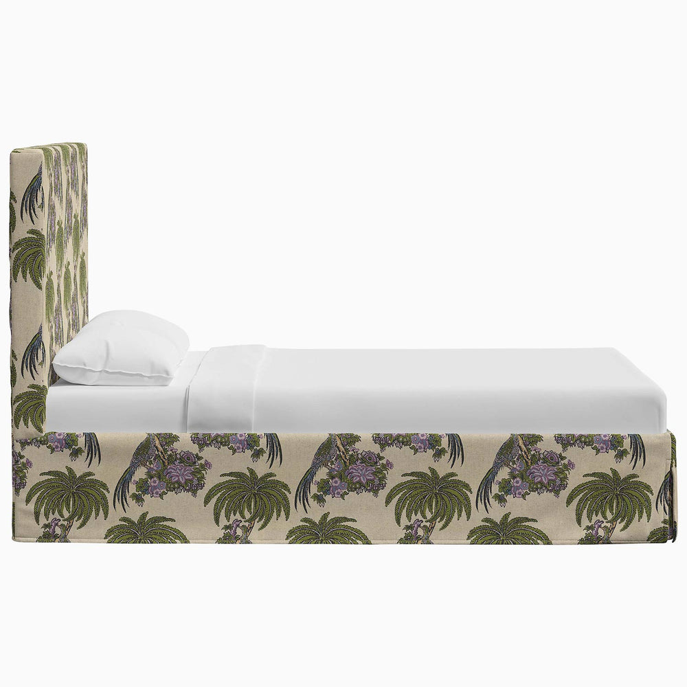 A John Robshaw Shona Bed with a tropical print headboard and footboard made from Shona fabric.