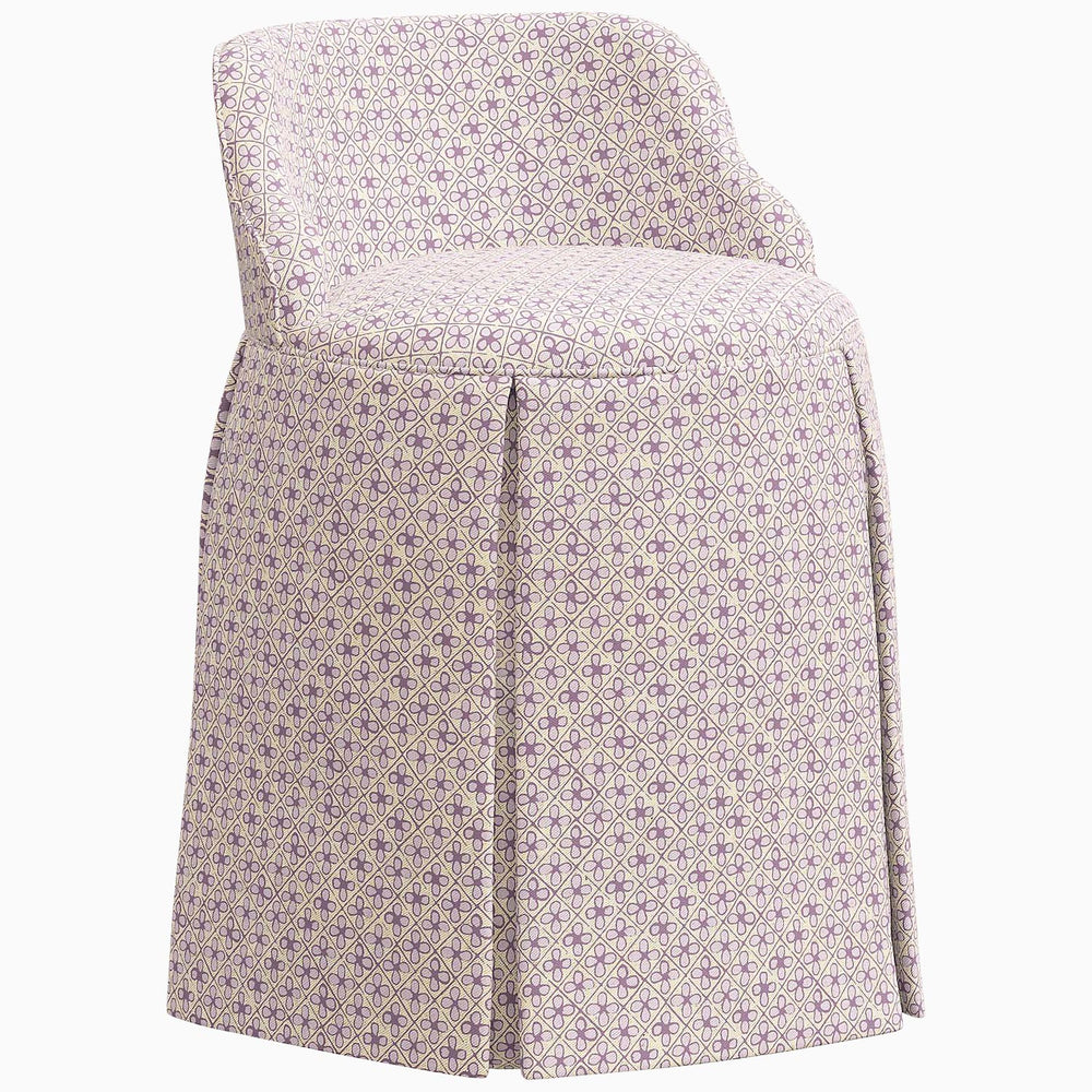 An elegant Meha Vanity Chair by John Robshaw with a floral pattern.
