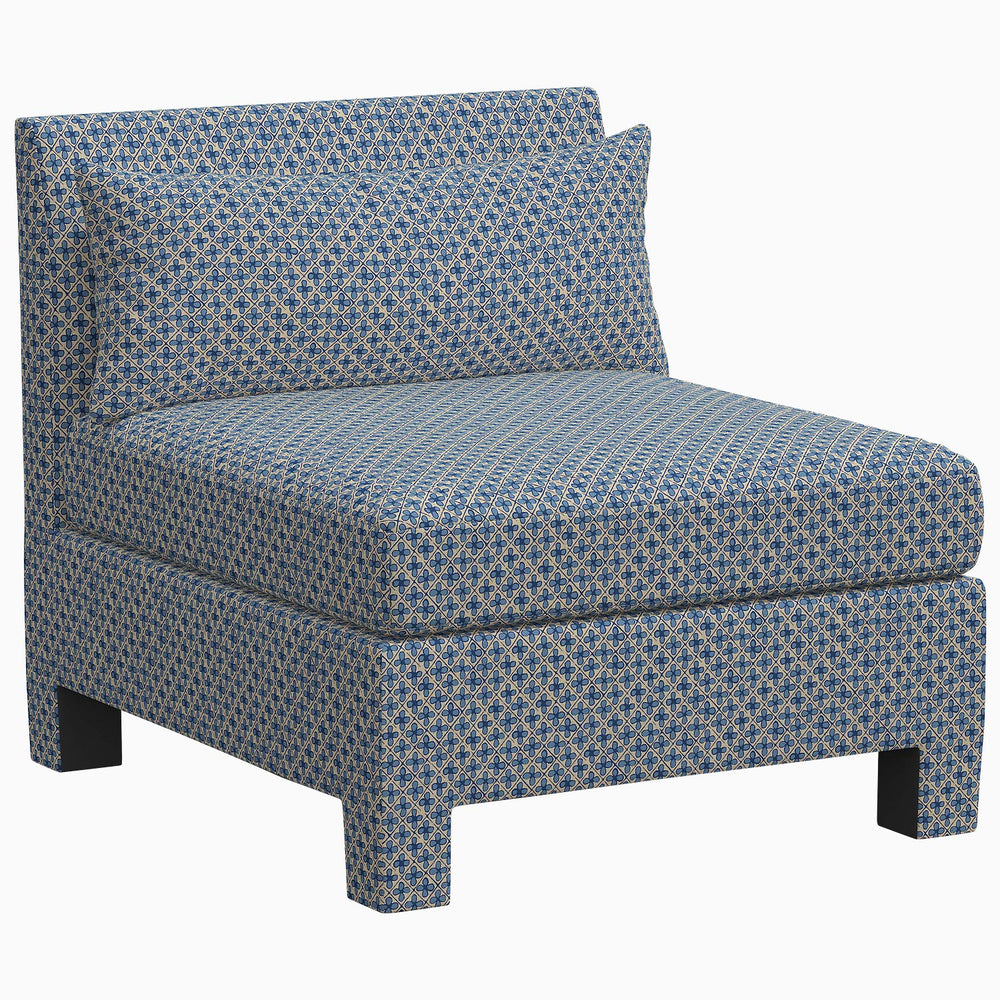 The John Robshaw Sameera Armless Chair is a custom seating arrangement featuring exclusive fabrics in a beautiful blue pattern, complete with a comfortable cushion.