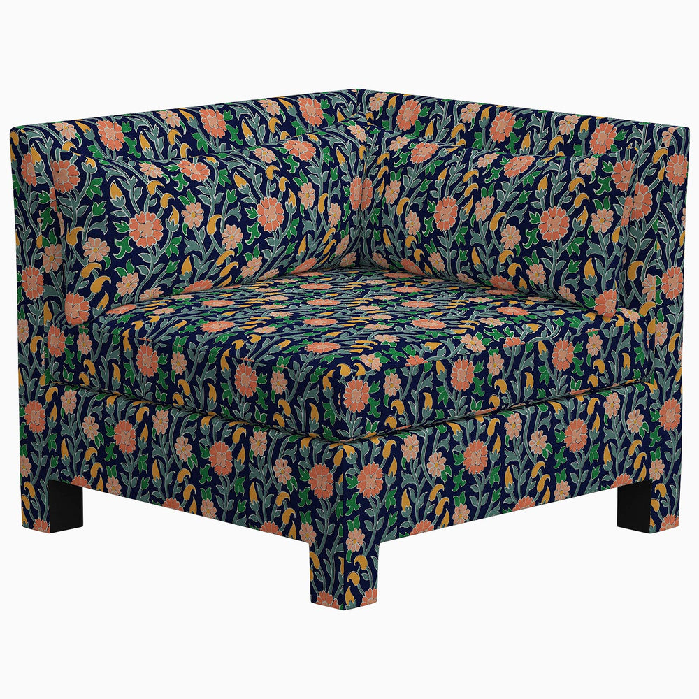 The John Robshaw Sameera Armless Chair is an exclusive seating arrangement with a floral pattern and custom design.