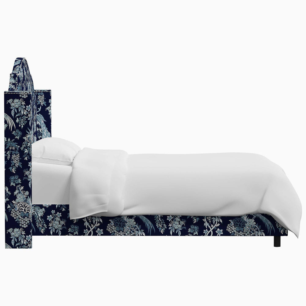 The John Robshaw Samrina bed features a beautiful blue and white floral pattern reminiscent of Mughal arches.