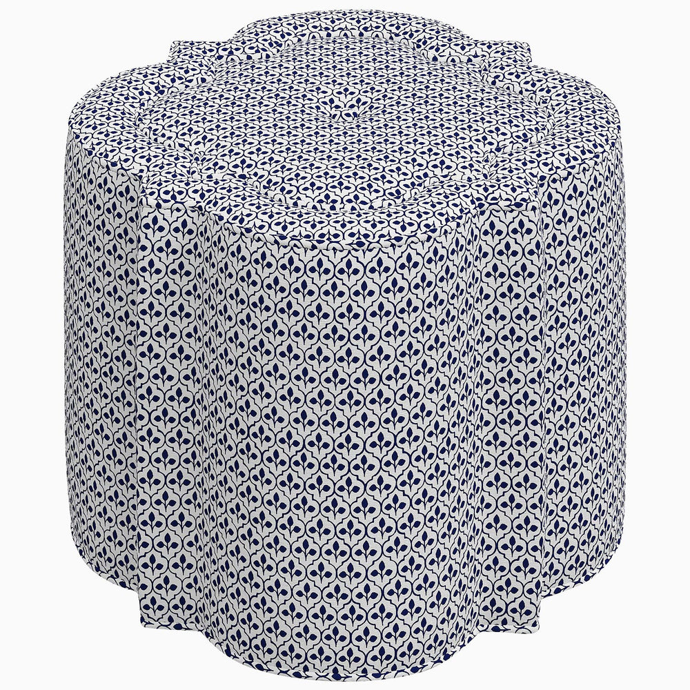 A Skyline Shiza Ottoman-inspired blue and white patterned stool reminiscent of the beautiful gardens of Kashmir, placed on a clean white background.
