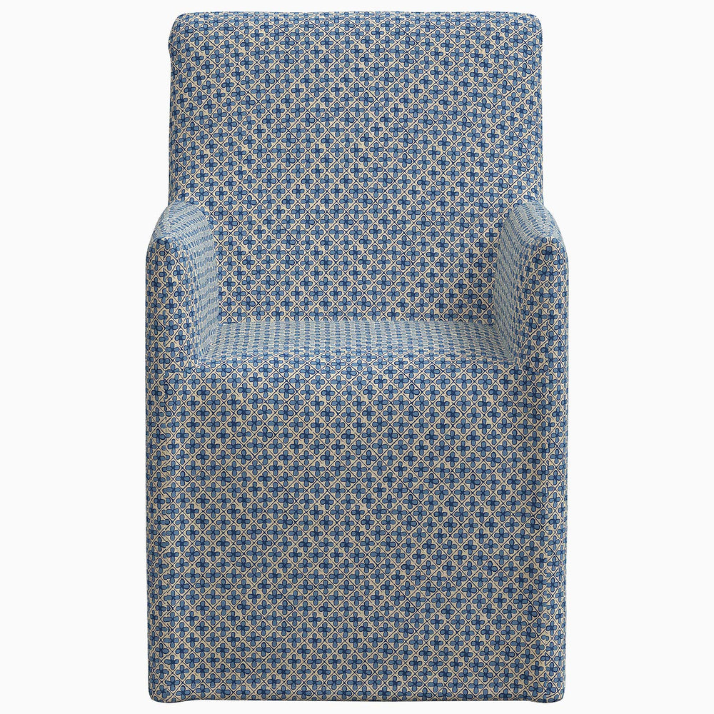 An exclusive Rekha Slipcover Dining Chair in John Robshaw's blue and white pattern.