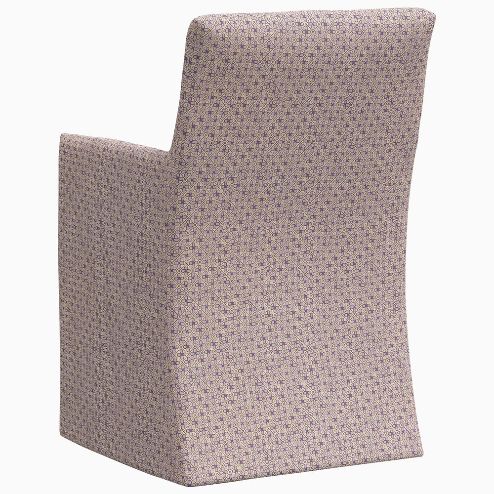 A John Robshaw Rekha Slipcover Dining Chair with an exclusive purple polka dot pattern.