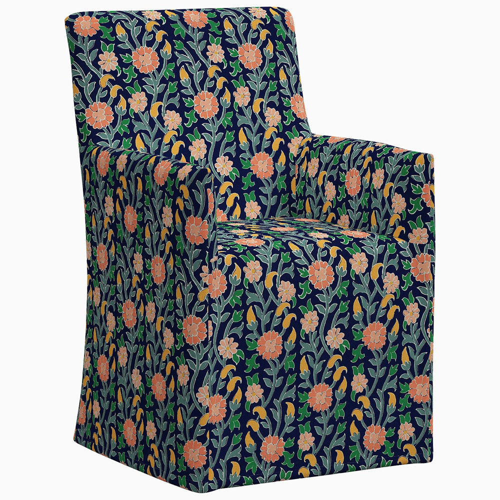 The John Robshaw Rekha Slipcover Dining Chair is a stylish and comfortable option with an exclusive floral pattern. Add a touch of sophistication to your dining room or living space with this chair featuring unique prints.