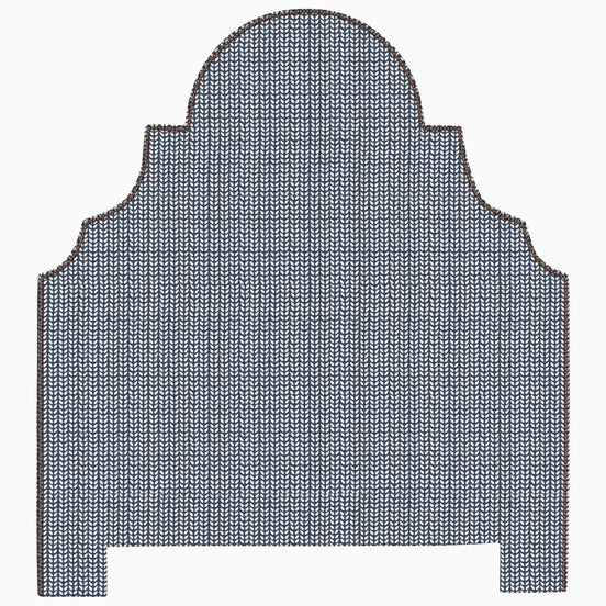 A Custom Dara Headboard by John Robshaw, with a blue and brown pattern, available for shipping.