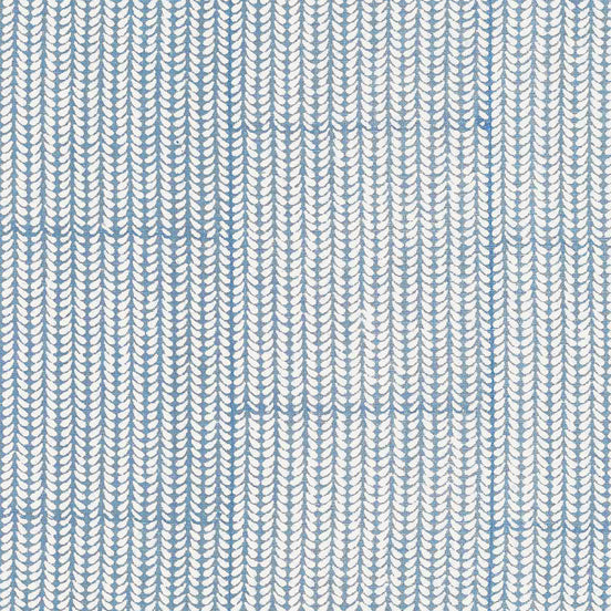 A close up of a beautifully hand block printed John Robshaw Aleppo Light Indigo Fabric showcasing exquisite craftsmanship.