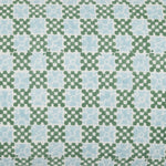 The Pipli Moss Bolster by John Robshaw features a block-printed design of alternating green and blue shapes resembling crosses with rounded edges arranged in a grid. Made from a linen cotton blend, this bolster is finished with meticulous hand-stitched edging. - 31263365333038