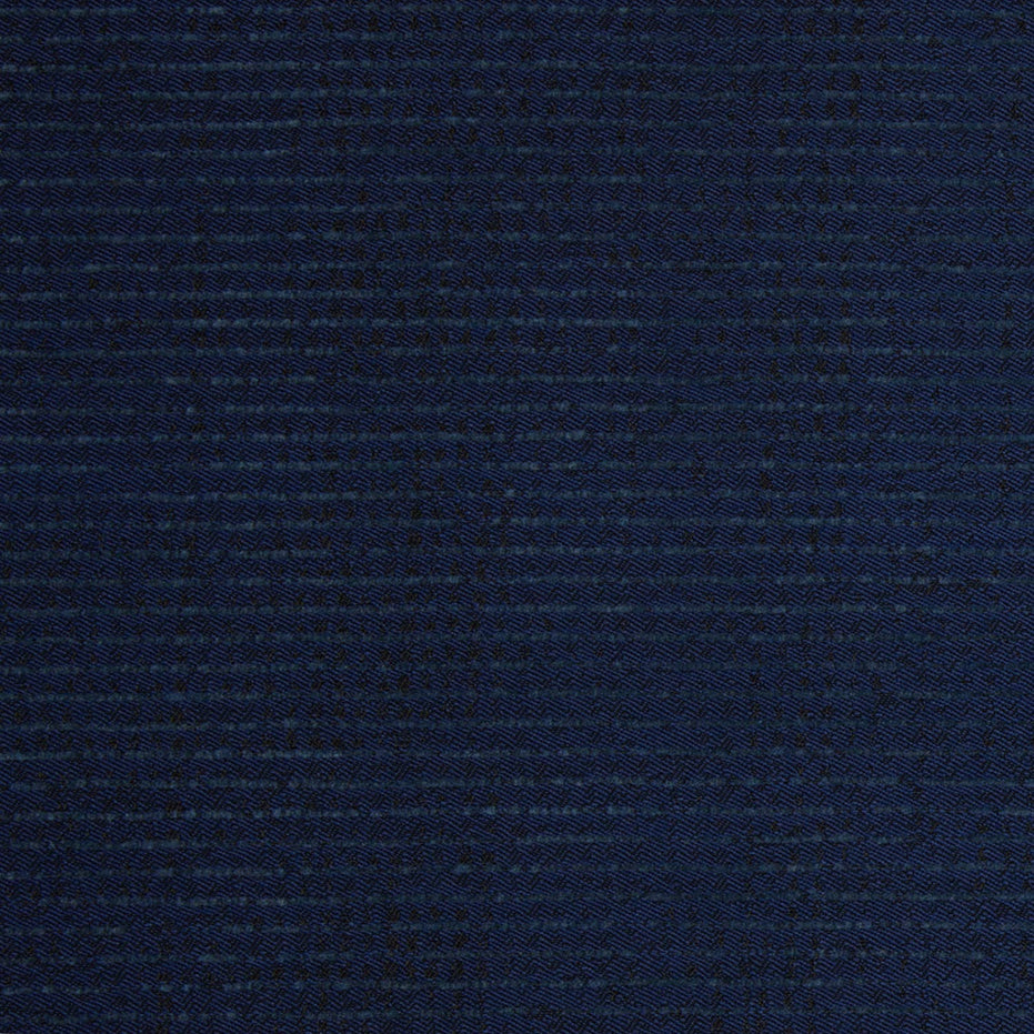 A close up image of a dark blue John Robshaw Bijal Indigo Performance Fabric suitable for indoor and outdoor use.