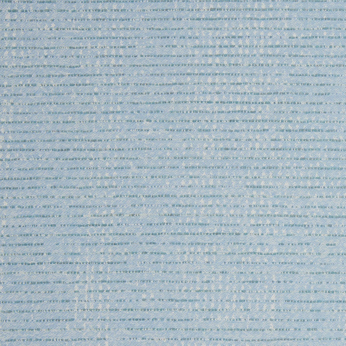 A Bijal Light Indigo Performance Fabric by John Robshaw, with small dots on it, perfect for a luxurious touch to any space.