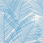 A Pihu Light Indigo Outdoor Bolster by John Robshaw with embroidered palm leaves on it. - 30404790812718