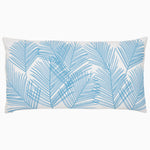 An embroidered Pihu Light Indigo Outdoor Bolster pillow with palm leaves on it by John Robshaw. - 30404791238702