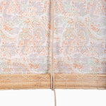 The Maanika Chik Blinds by John Robshaw Textiles are fabric and bamboo roll-up shades with a pastel floral pattern and a rope pull cord, blending the delicate charm of cotton voile with an authentic handmade Indian chik design. - 31884734824494