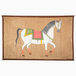 A hand-painted vintage treasure depicting a White Horse with Link Saddle Tapestry on a brown background, reminiscent of traveling in India. (John Robshaw) - 30670122352686