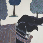 An Indigo Elephant Decorative Pillow in front of trees. - 30400301858862