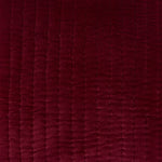 A close up image of a John Robshaw Velvet Berry Decorative Pillow with tassels. - 30404955471918