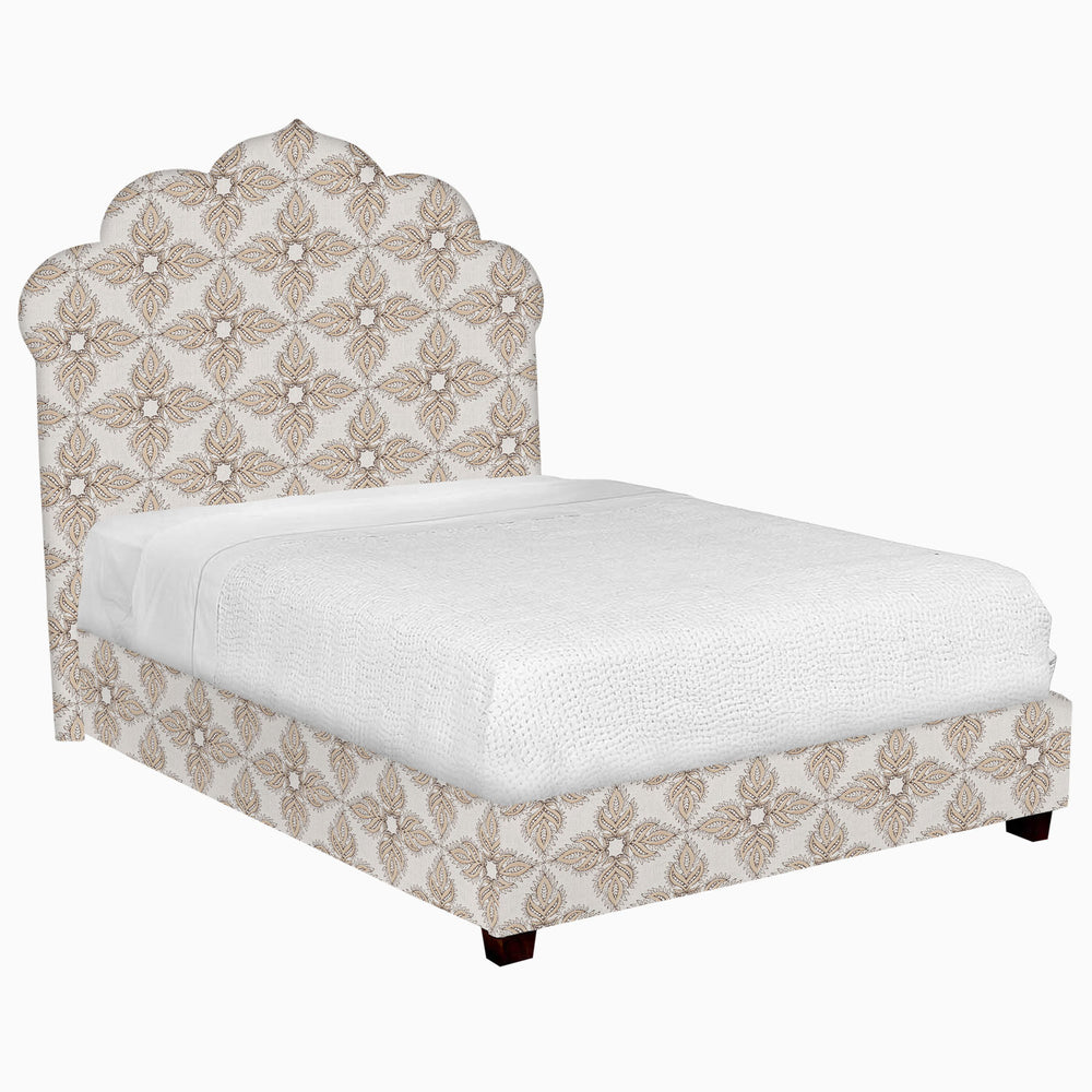 A Custom Bihar Bed by John Robshaw with a beige fabric patterned headboard and footboard.
